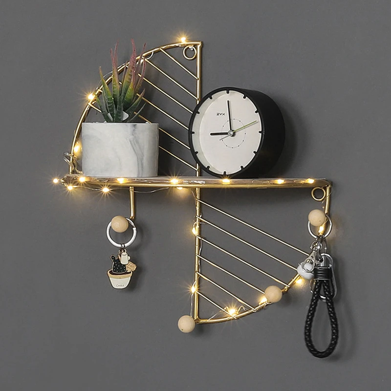 Metal Wall Storage Shelf in Gold and Black Metal Wall Storage Shelf in Gold and Black