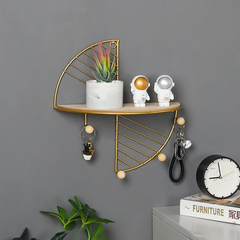 Metal Wall Storage Shelf in Gold and Black Metal Wall Storage Shelf in Gold and Black